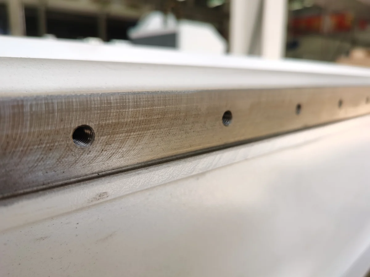 Machined linear guide mounting surface on CC-481 CNC router frame