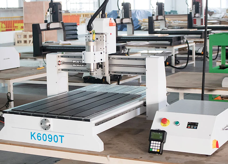 K6090T compact CNC router in the Quick CNC workshop